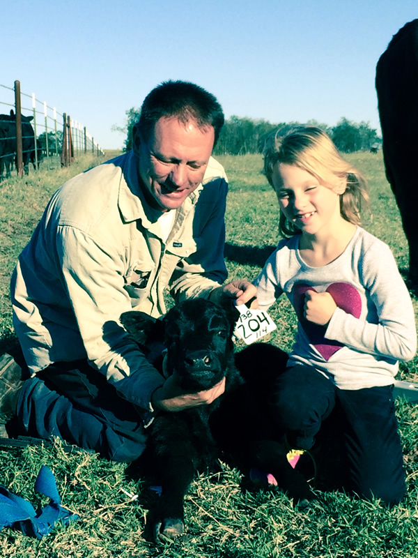 Mike, Emily and David's first calf